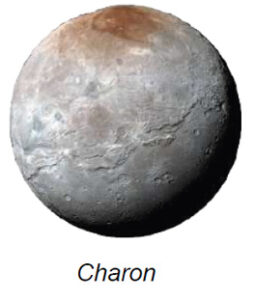 The image shows Charon, Pluto's largest moon, in a high-resolution photograph. It appears as a spherical celestial body characterized by varying shades of gray. The upper region of Charon displays a distinct reddish-brown coloration, likely caused by tholins, which are complex organic molecules. The surface features numerous craters, ridges, and valleys, with several light and dark areas indicating a diversified terrain. The lower section exhibits darker hues compared to the brighter midsection.