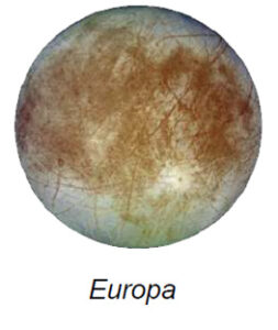 The image shows a view of Europa, one of Jupiter's moons. It is a spherical celestial body with a rough, textured surface. The surface is predominantly covered in reddish-brown streaks and patches, interspersed with lighter areas that appear icy blue and white. These features create a complex, cracked appearance reminiscent of a frozen ocean. The reddish-brown lines suggest a network of ridges and fractures, while the white regions are likely ice deposits. The overall color palette includes earthy browns, icy blues, and bright whites.