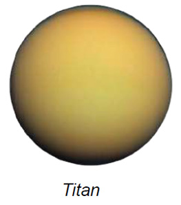 The image presents Saturn's moon, Titan, depicted as a large, spherical object dominating the frame. The surface of Titan appears smooth with a predominantly orange hue, transitioning into subtle shades of yellow and brown. The edges of Titan are slightly darker, creating a vignette effect, contributing to a sense of dimension and depth.